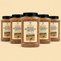 Five clear plastic jars of E&A Premium Foods Roasted Buckwheat Groats arranged in a fan shape on a solid beige background. The center jar is fully visible, with four jars partially obscured behind it on each side.